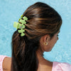 TELETIES medium lime green hair claw clip featuring a Disney Pua and Heihei graphic for secure, damage-free styling.
