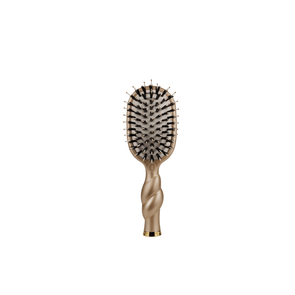 TELETIES Mini Boar Bristle hair brush in Golden Glow with a twisted gold handle and dark bristles on a white background
