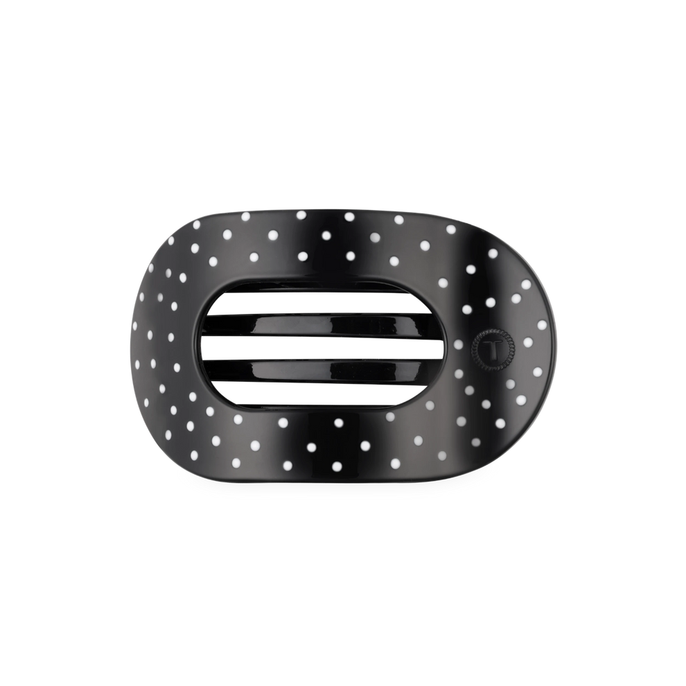 TELETIES medium flat round hair clip in black with a white polka dot pattern, designed for comfortable leaning.
