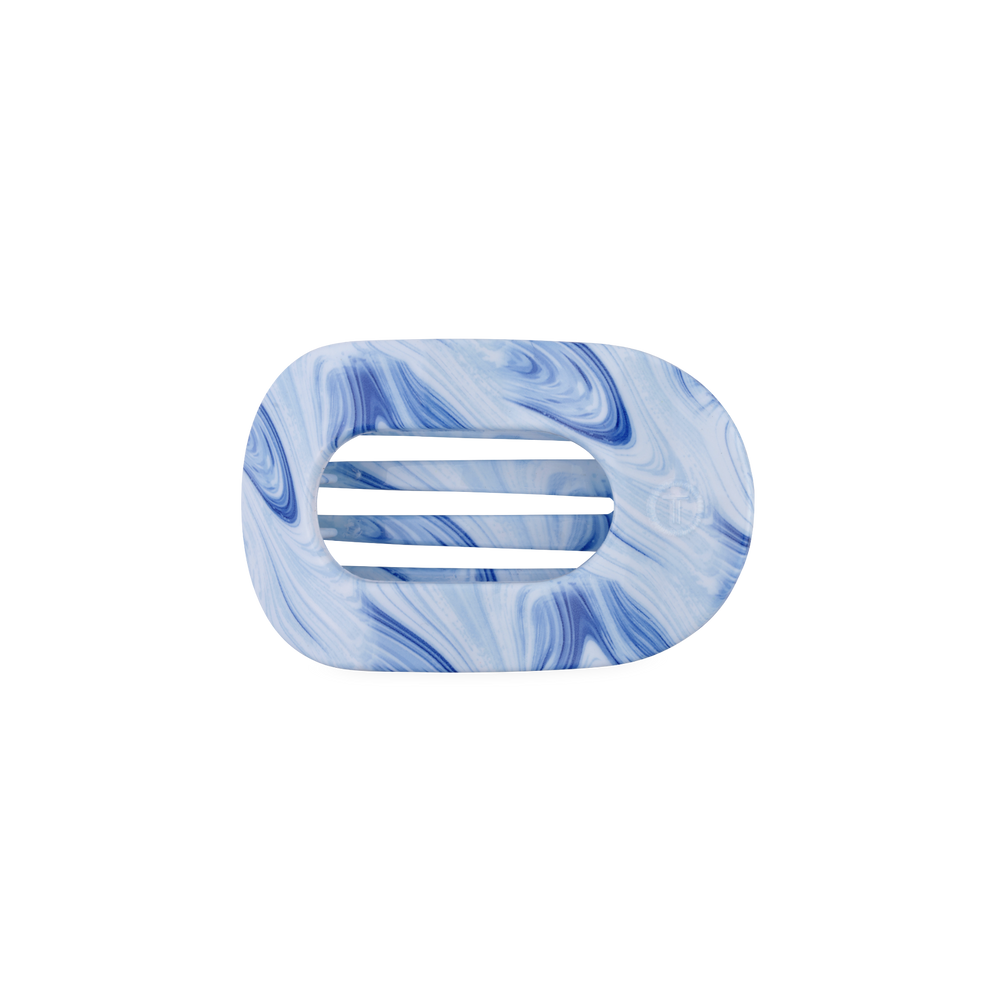 TELETIES blue marbled small flat round hair clip with bendable teeth for comfortable wear.
