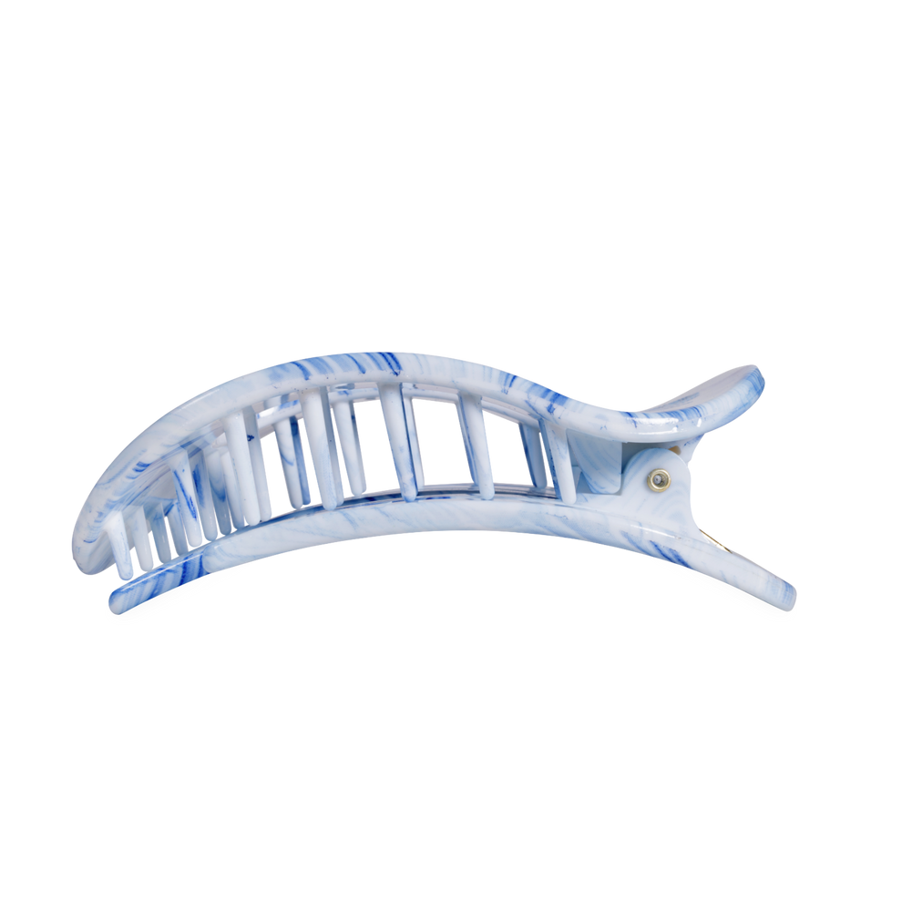 TELETIES blue marbled large flat round hair clip with bendable teeth for a secure hold.
