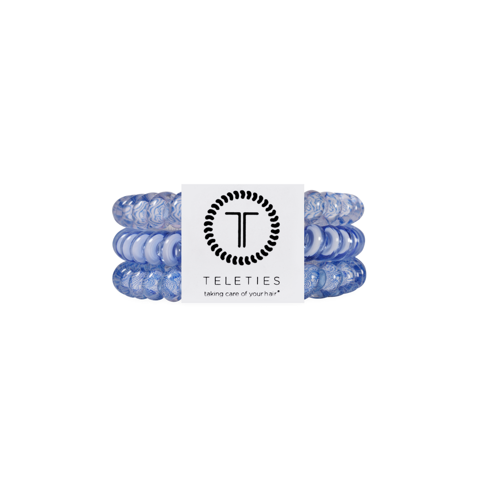 TELETIES blue small spiral hair ties, sold in a pack of three, gentle on hair and waterproof.
