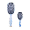 TELETIES Tide & True Boar Bristle Hair Brush Bundle in blue and white tie-dye pattern with gold accents.
