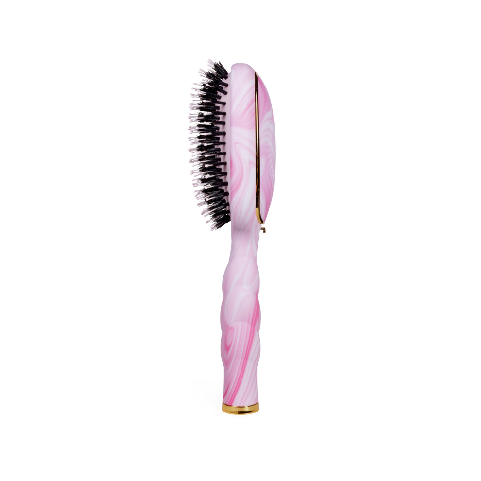 TELETIES pink tie-dye boar bristle hair brush with gold accents and a twisted handle. Ideal for smoothing frizz and distributing oils.
