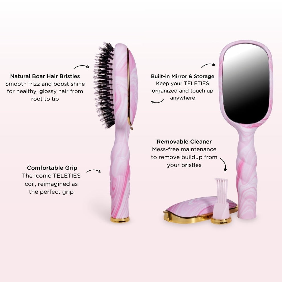 TELETIES pink and white tie-dye boar bristle hair brush with built-in mirror and cleaner.
