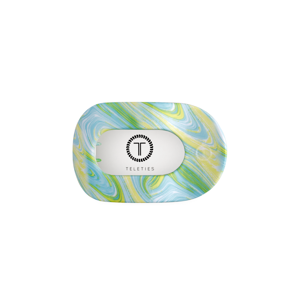 TELETIES By the Sea Shore small flat round hair clip in green and yellow swirled pattern. Bendable teeth.
