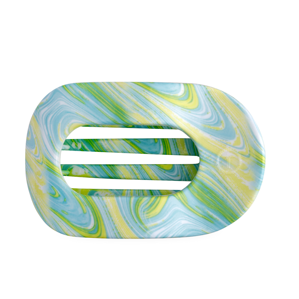 TELETIES By the Sea Shore large flat round hair clip in green with blue and yellow swirls. Bendable teeth.
