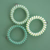 TELETIES By the Sea Shore large spiral hair ties in green, aqua, and white with yellow accents. Pack of 3.
