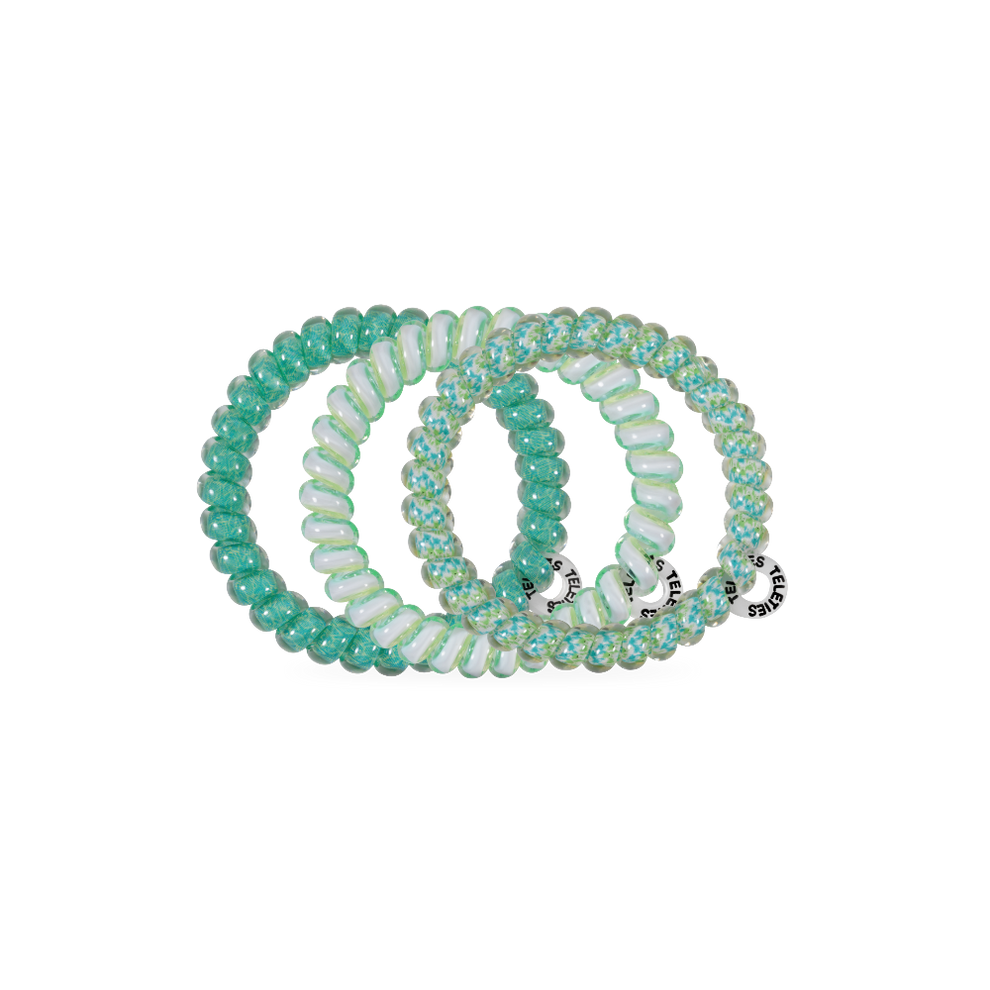 TELETIES By the Sea Shore small green spiral hair ties, sold in packs of three. Gentle on hair, waterproof, and doubles as a bracelet.
