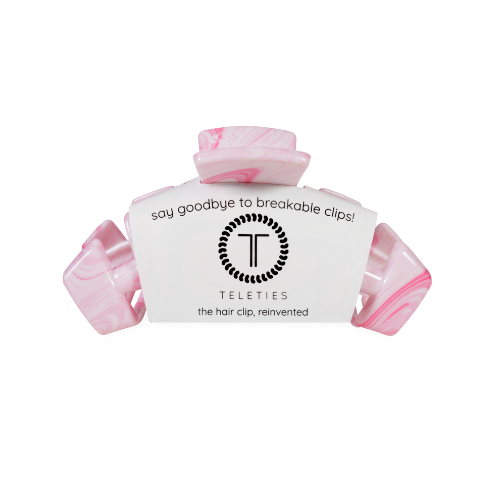 TELETIES Classic Pinch Me! Medium Claw Clip in pink with a marbled pattern. Features bendable teeth for a secure hold.

