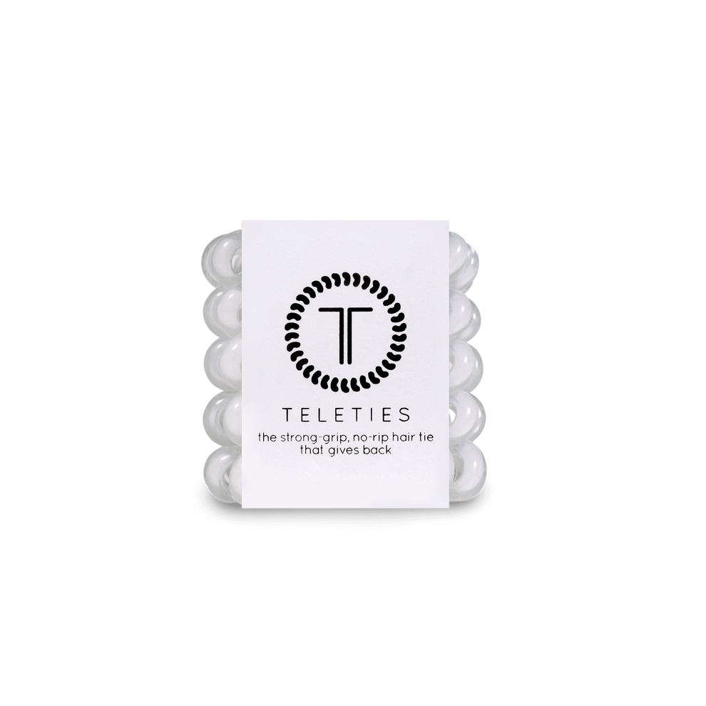 TELETIES Coconut White Tiny Hair Ties are clear, spiral-shaped hair coils for thin hair, braids, and kids. Gentle, waterproof.
