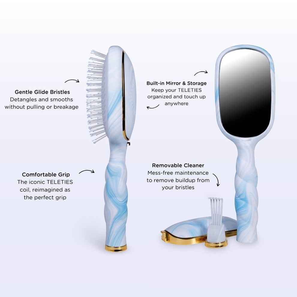 TELETIES blue and white marbled detangler hair brush with built-in mirror and storage, and removable cleaner.
