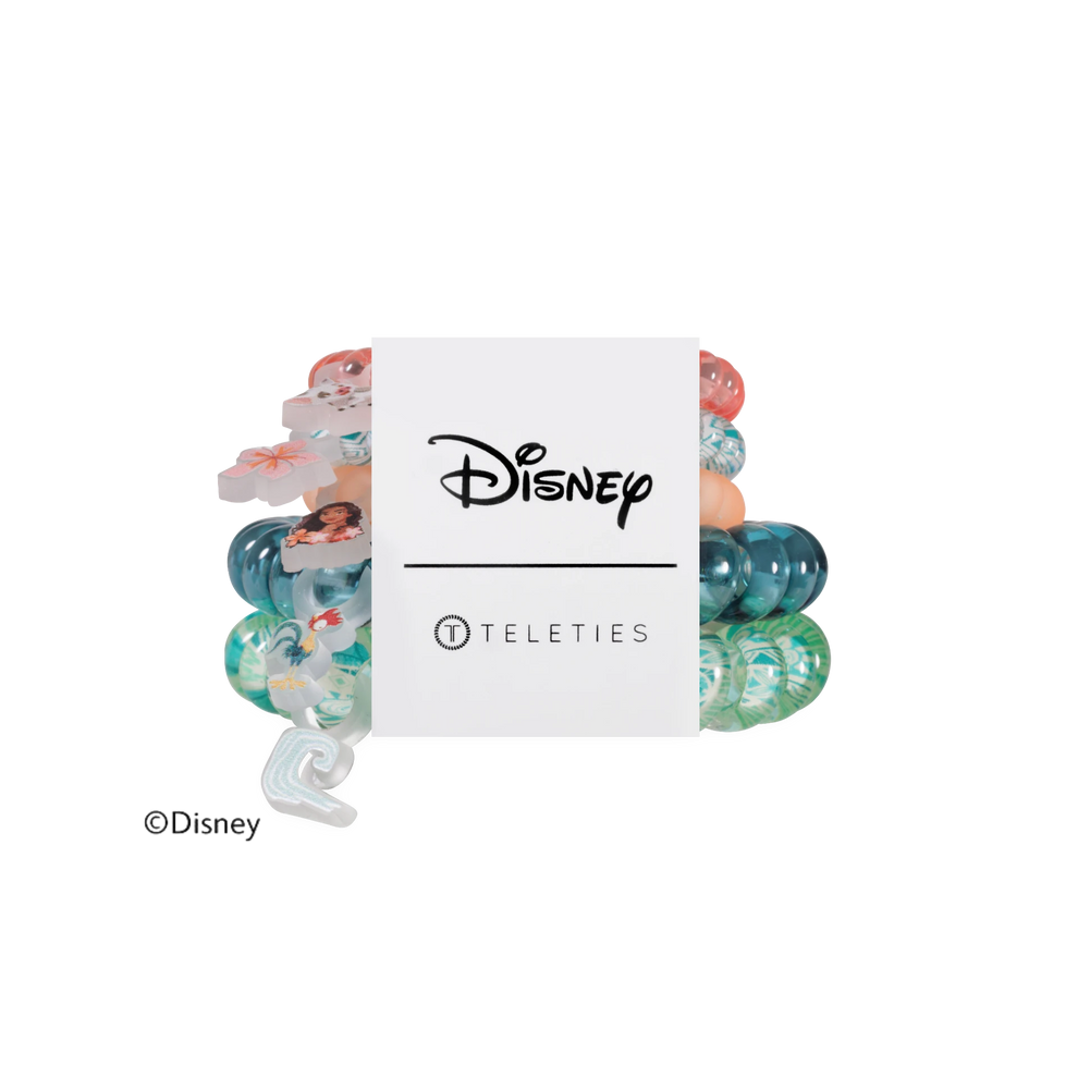 TELETIES Disney Moana mixed hair ties featuring spiral coil design in blue, green, and peach with character charms.
