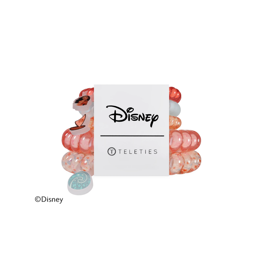 TELETIES Disney Moana mixed pack hair ties featuring spiral coil design in coral and white with character charms.
