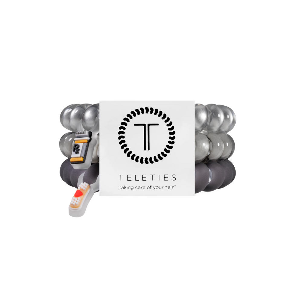 TELETIES Good Hair Rx large hair ties in a pack of three featuring grey and white spiral coils with medical charms.
