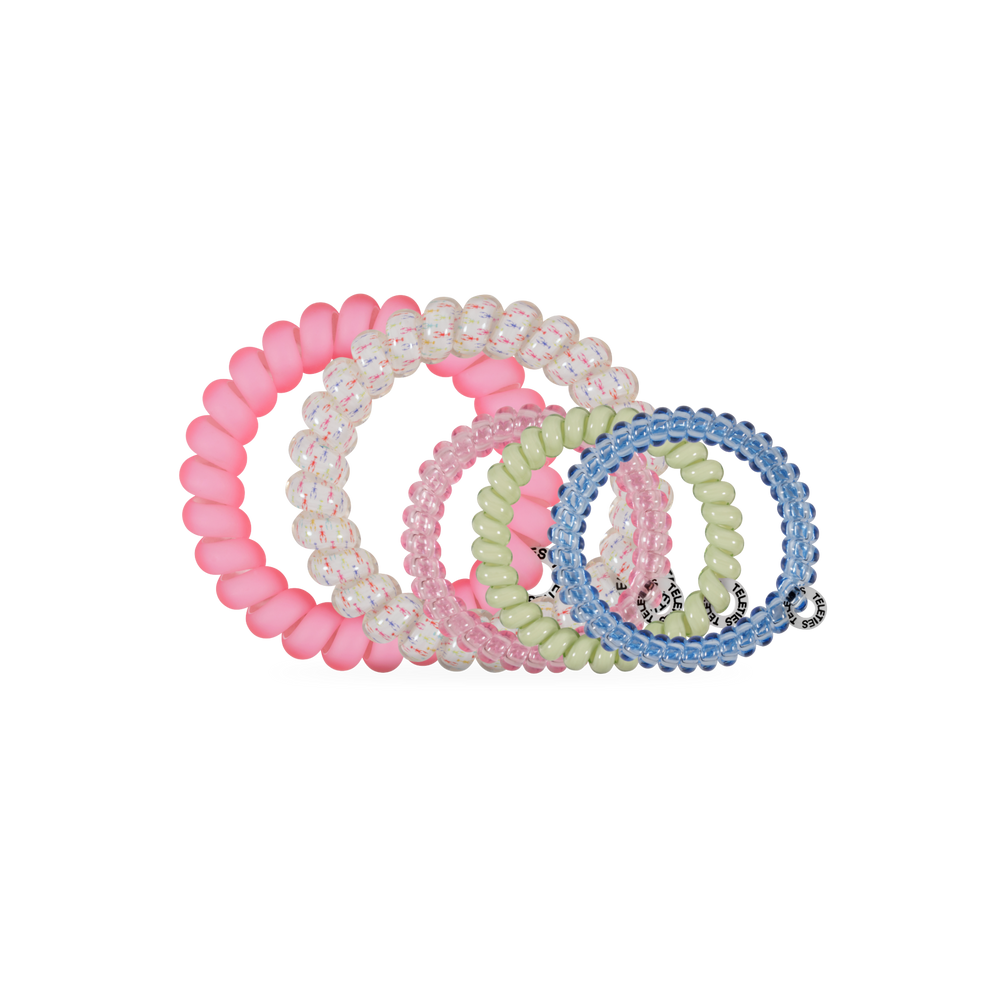TELETIES Pinch Me! Mix Pack hair ties in pink, white with glitter, light pink, pale green, and blue. Spiral design.
