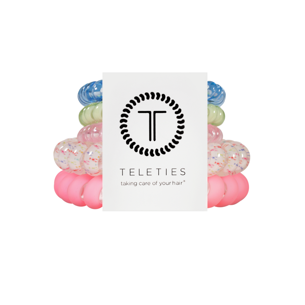 TELETIES Pinch Me! Mix Pack hair ties in pink, pastel blue, green, and confetti patterns. Strong grip, no rip design.
