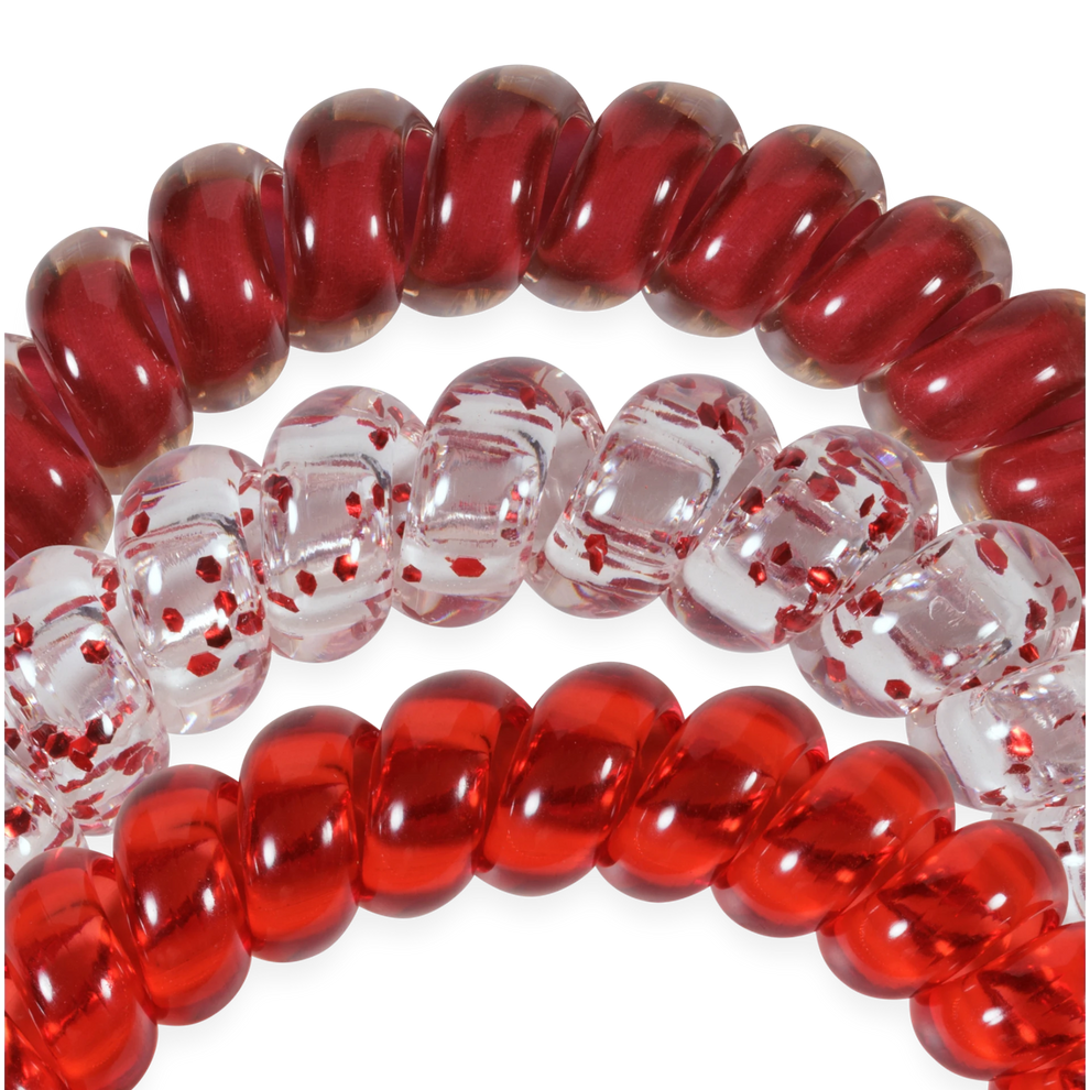 TELETIES Heart and Hustle large spiral hair ties in red and clear glitter designs for a secure, no-rip hold.
