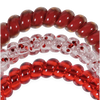 TELETIES Heart and Hustle small spiral hair ties in red and clear with red glitter accents for a secure, no-rip hold.
