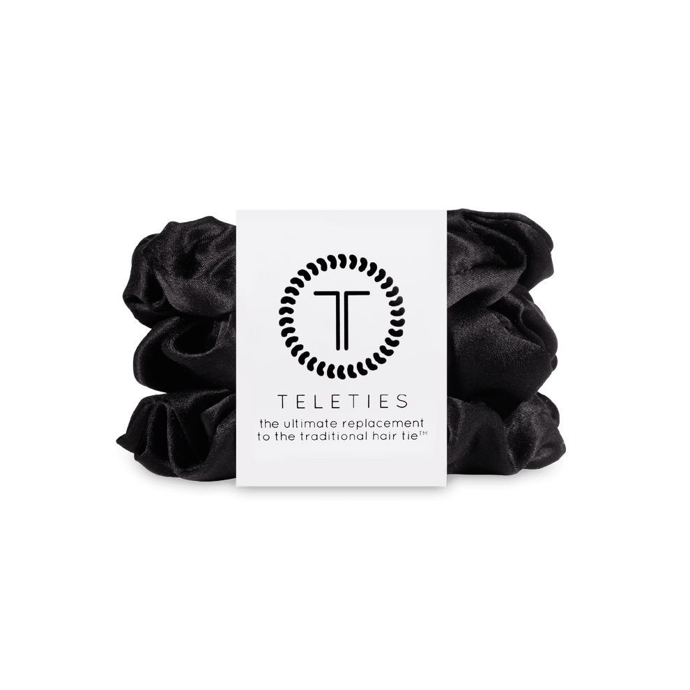 TELETIES jet black large silk scrunchies, sold in a pack of three. Gentle on hair, prevents breakage, headaches and creases. Made from 100% silk for added comfort and style.
