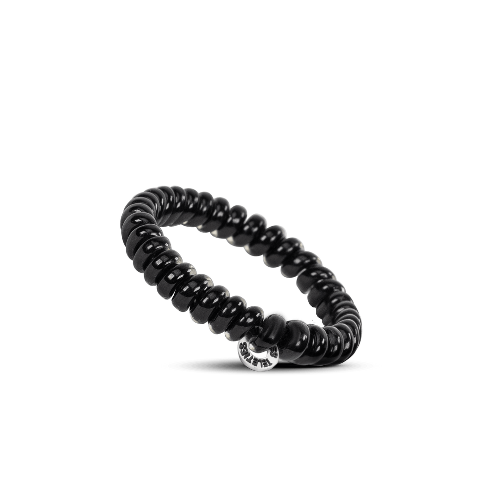 TELETIES jet black small spiral hair ties with a strong grip, doubling as a bracelet.
