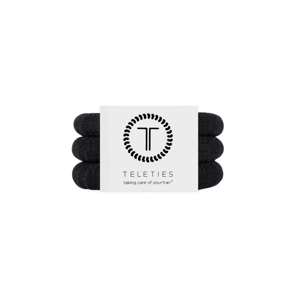 TELETIES small nylon hair ties in jet black. Pack of three, ideal for thick curly hair with a strong hold. Perfect for workouts and active lifestyles.
