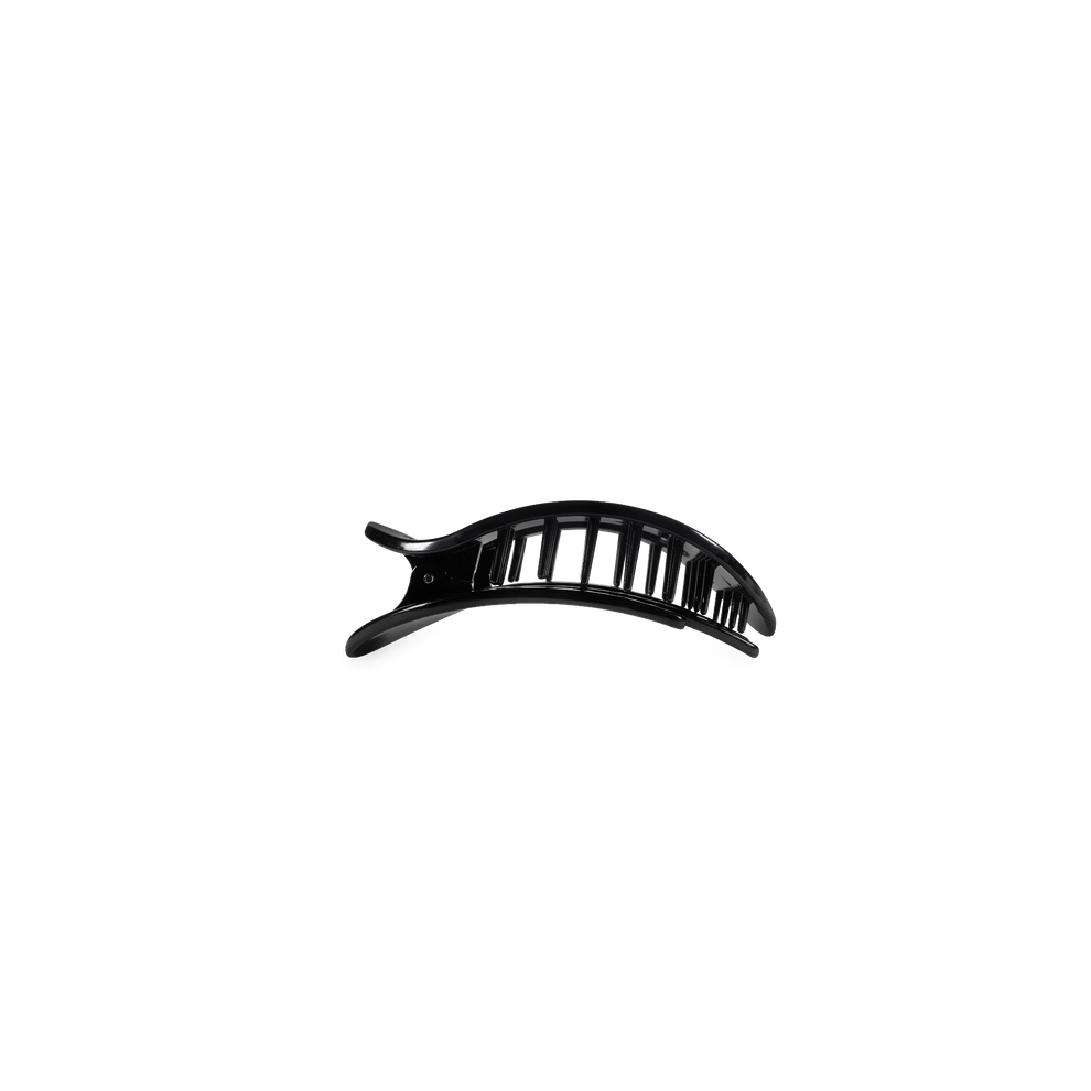 TELETIES jet black tiny flat round clip with a curved design and interlocking teeth for secure hold.
