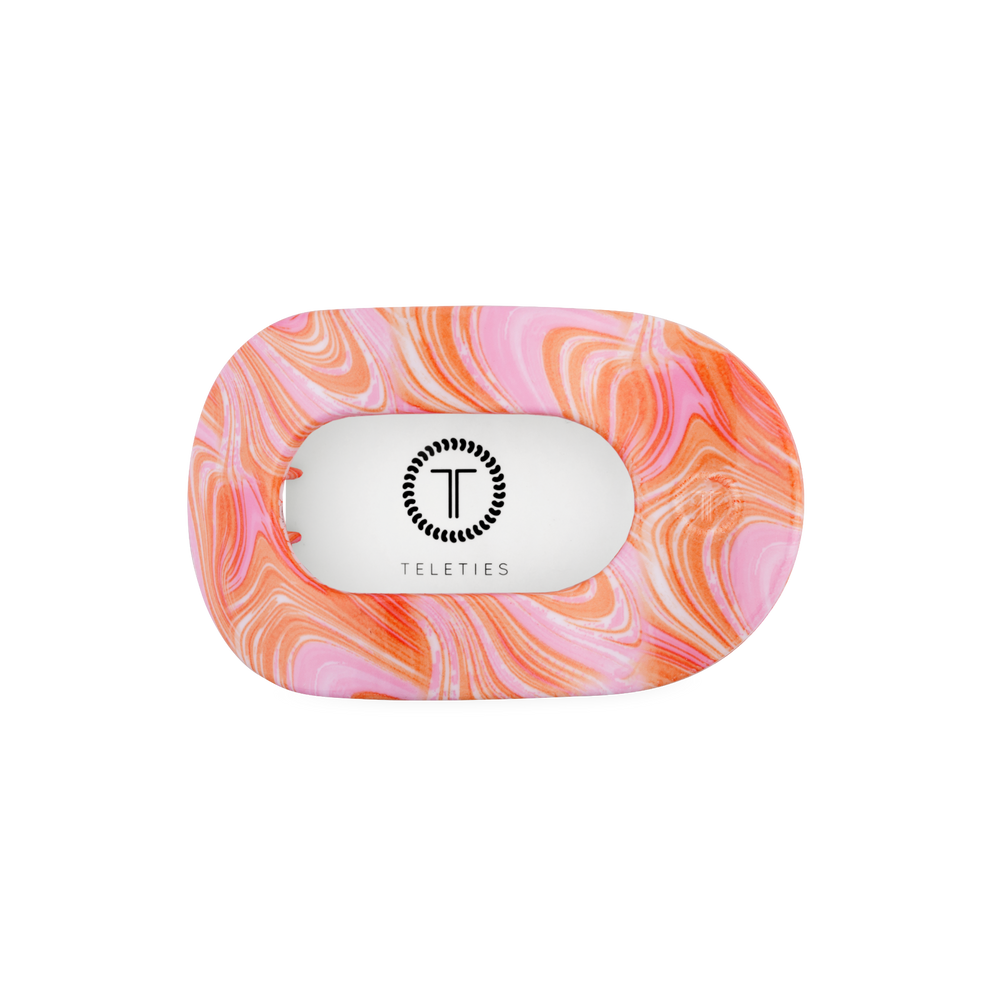 TELETIES Just Keep Swimming medium flat round hair clip in pink and orange marble pattern. Bendable teeth for secure hold.
