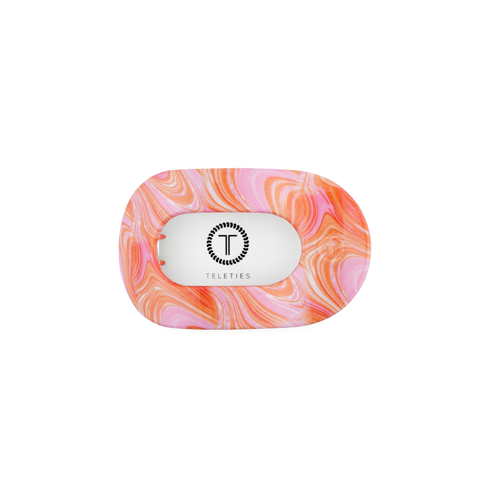 TELETIES Just Keep Swimming small flat round hair clip in pink and orange marble pattern. Bendable teeth for a secure hold.
