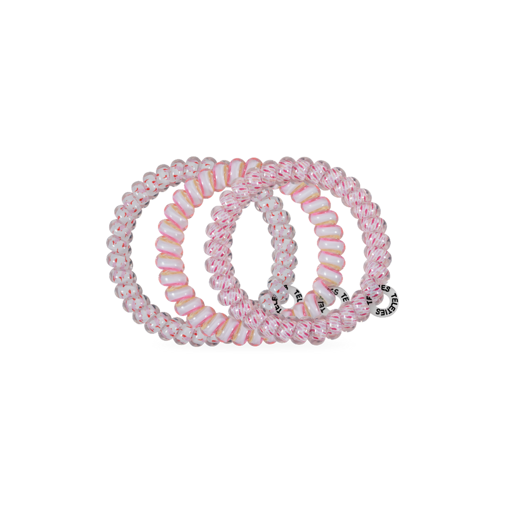 TELETIES Just Keep Swimming small pink and white spiral hair ties, pack of 3. Gentle, waterproof, and doubles as a bracelet.
