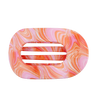 TELETIES Just Keep Swimming large flat round hair clip in pink and orange marble pattern. Bendable teeth.
