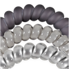 TELETIES Good Hair Rx large spiral hair ties in grey and clear shades, designed for a secure, no-rip hold.
