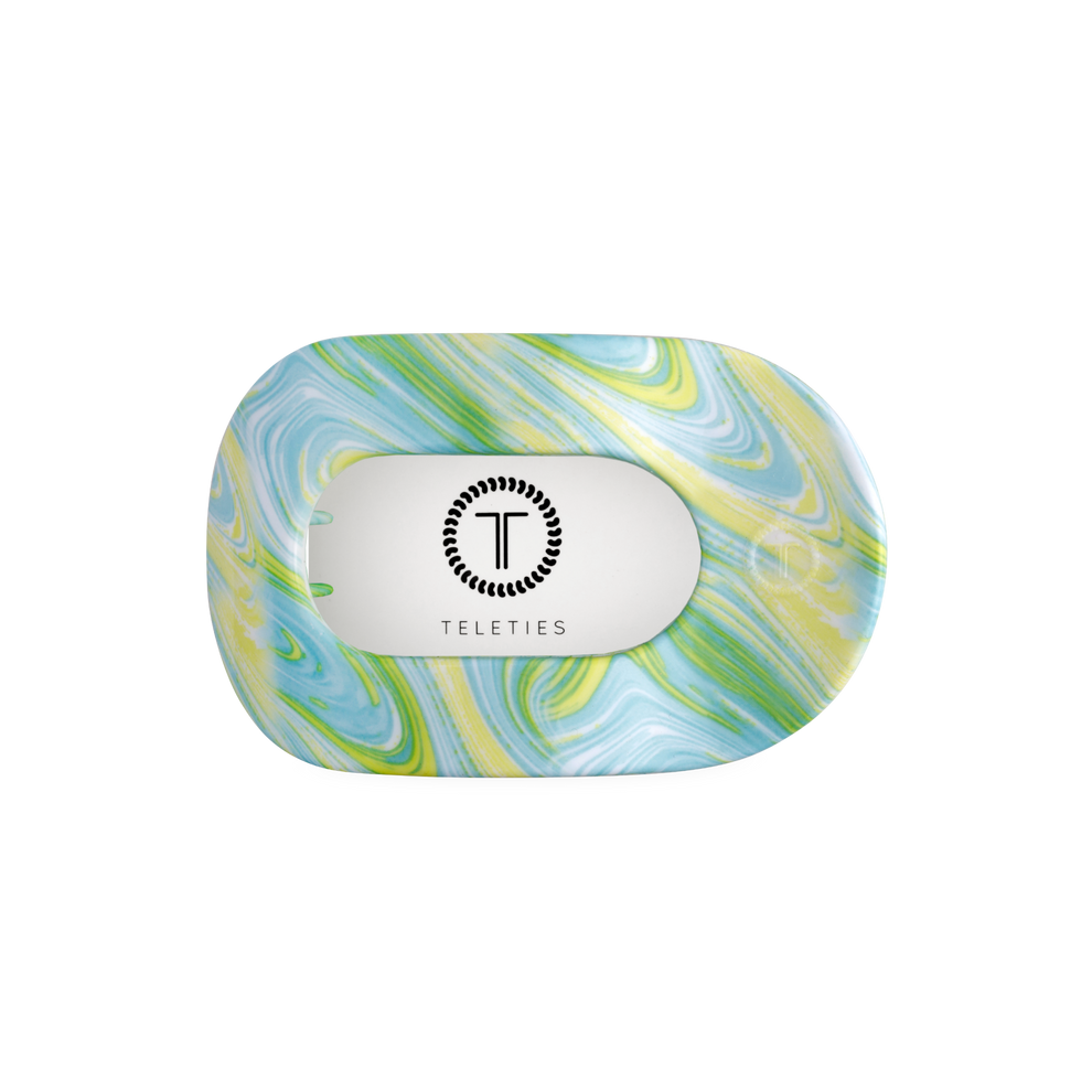 TELETIES By the Sea Shore Medium Flat Round Hair Clip in swirled green, blue, and yellow. Bendable teeth for a secure hold.
