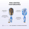 TELETIES mini vented hair brush with blue marble handle and gold bristles, features quick-heat plate and removable cleaner.
