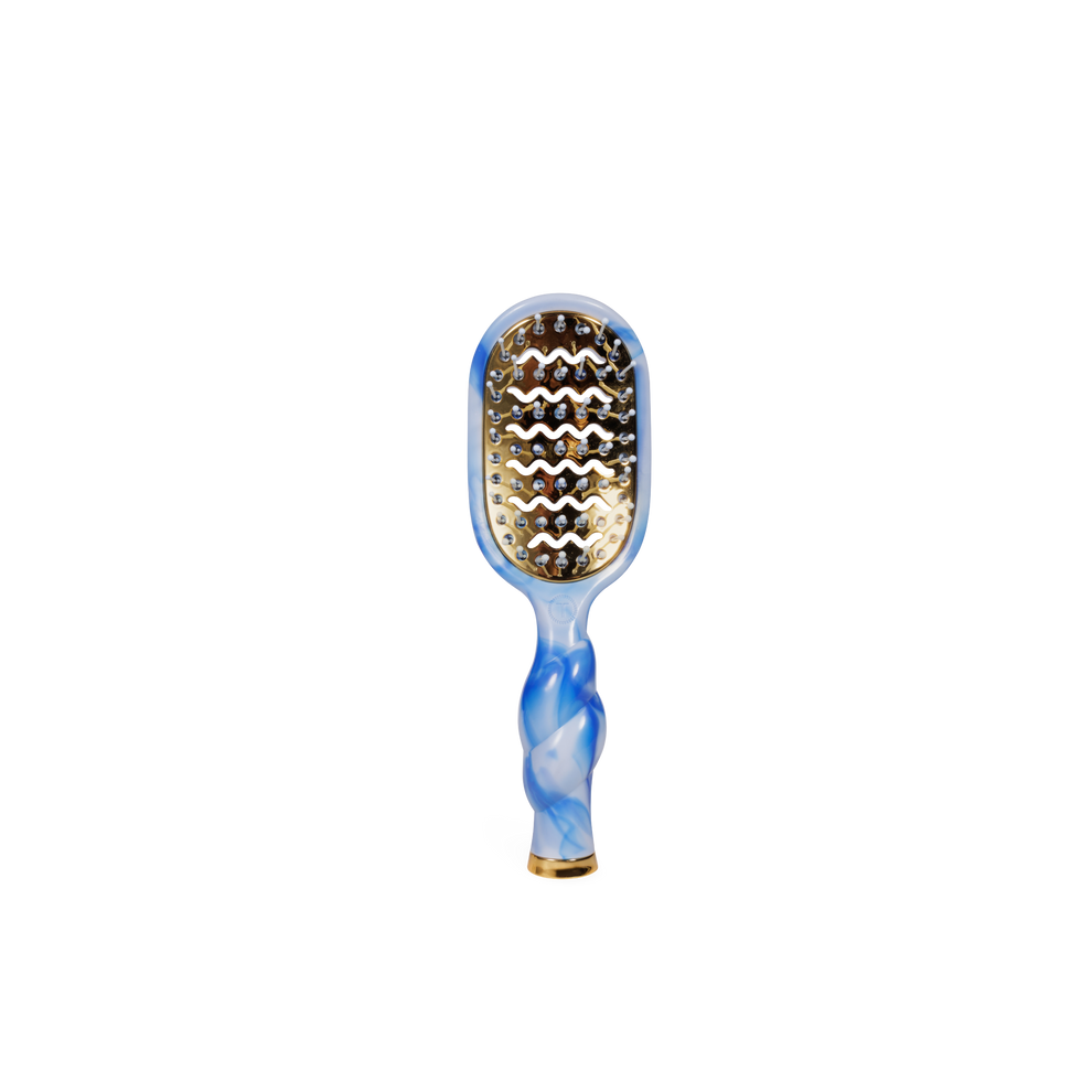 TELETIES mini vented hair brush with blue and white marbled handle and gold accents. Ideal for travel.
