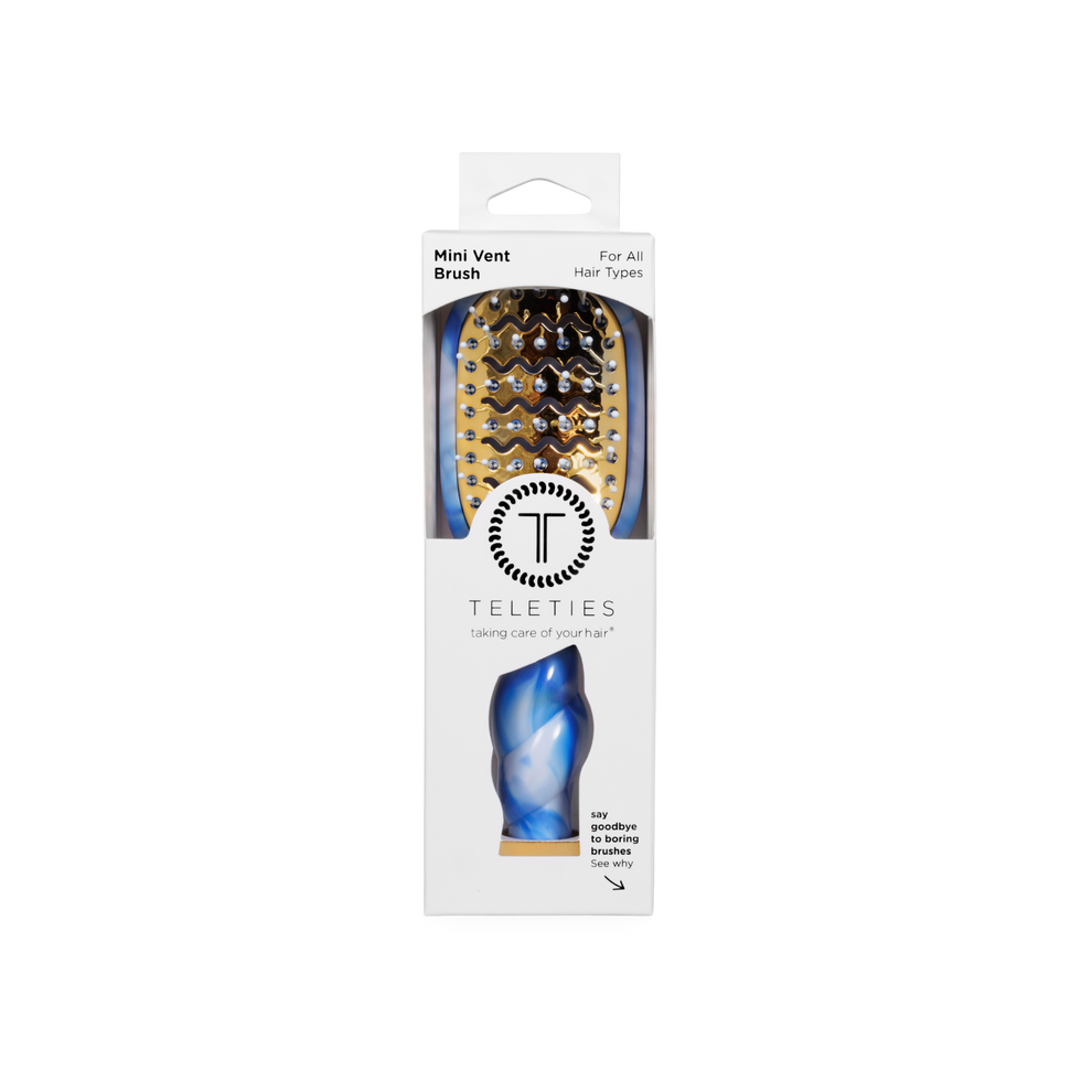 TELETIES mini vented hair brush with gold wavy plate and blue marbled handle, for all hair types.
