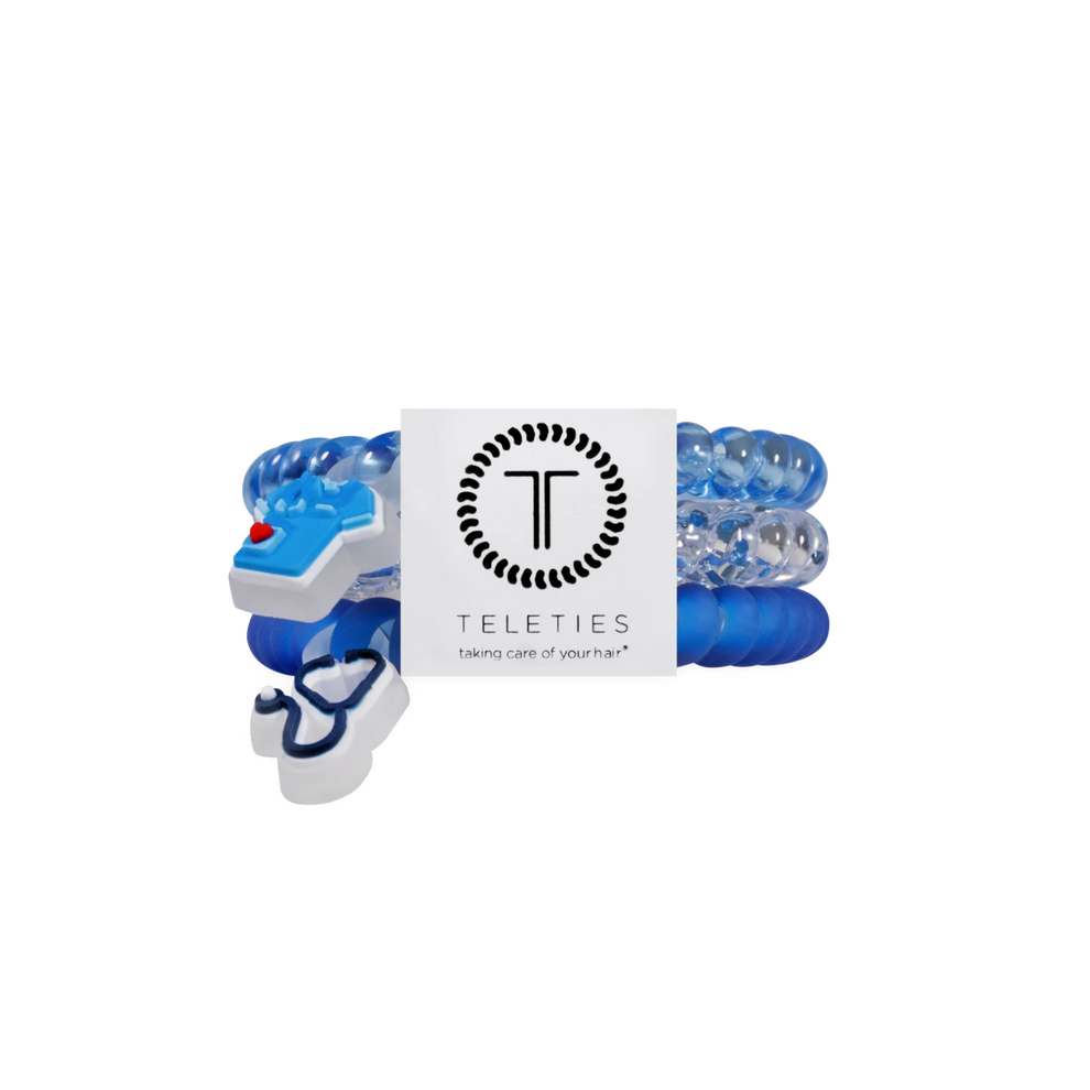 TELETIES On Call small hair ties in blue with medical-themed charms including a stethoscope and scrub top

