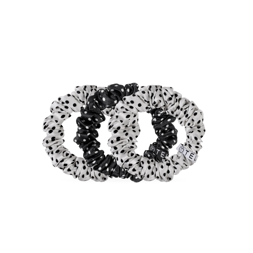 TELETIES small silk scrunchies in a black and white polka dot print, featuring a non-slip inner coil design.

