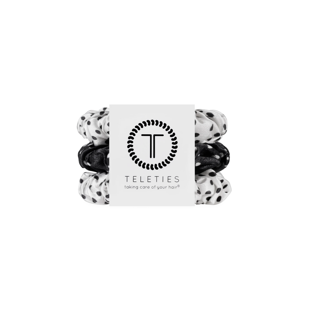 TELETIES small silk scrunchies in a black and white polka dot print, featuring a patented non-slip inner coil.
