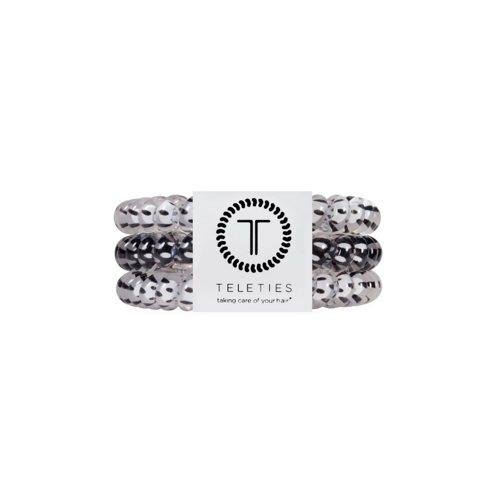 TELETIES small spiral hair ties in a black and white polka dot print, designed for fine hair and braids.

