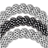 TELETIES large spiral hair ties in a black and white polka dot pattern, designed for a strong, crease-free hold.
