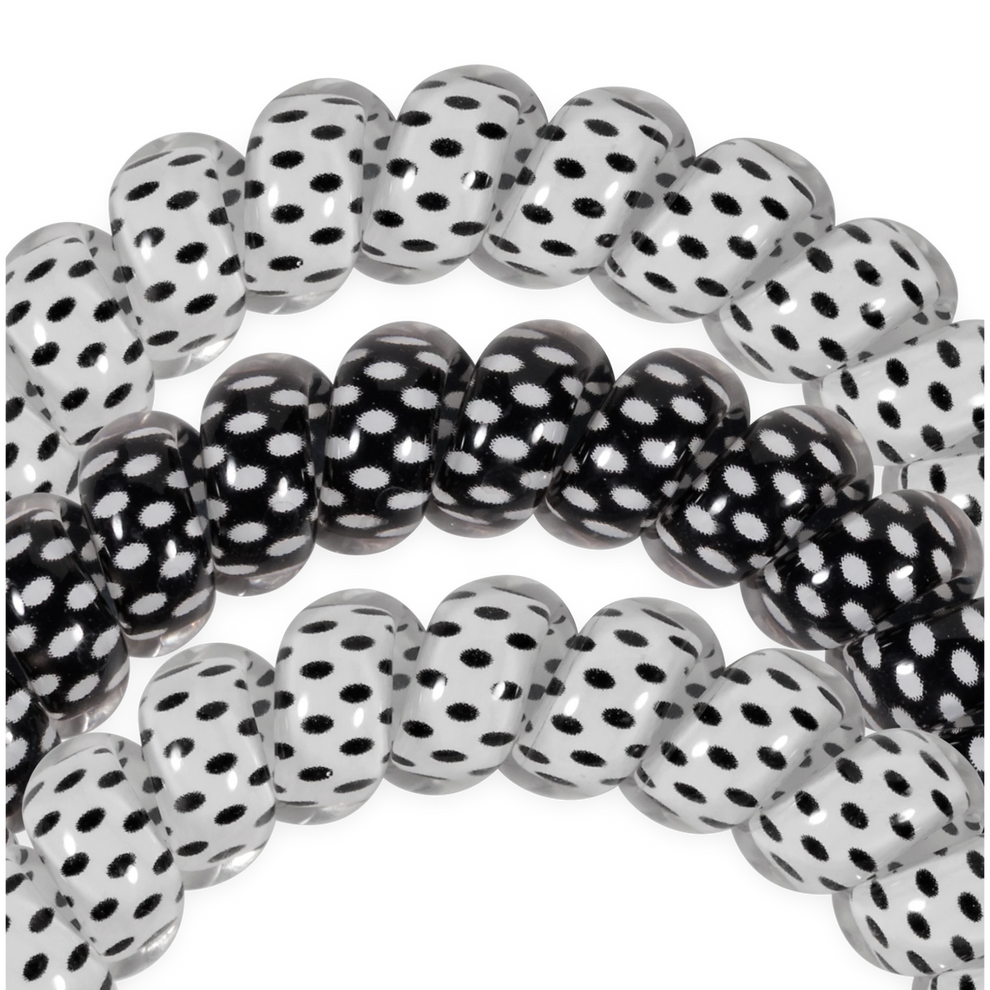 TELETIES large spiral hair ties in a black and white polka dot pattern, designed for a strong, crease-free hold.
