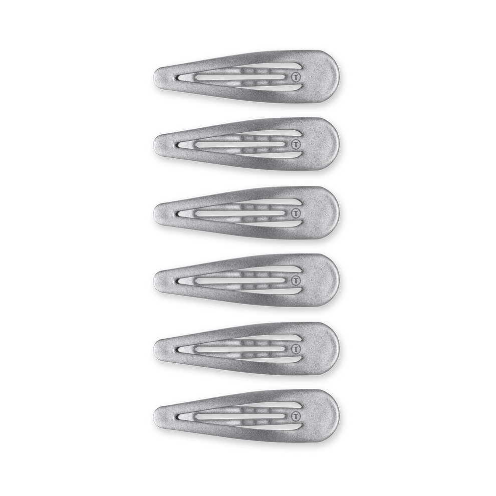 TELETIES 6-count silver snap clips with seamless tips for a no-snag feel. Ideal for all hair types.
