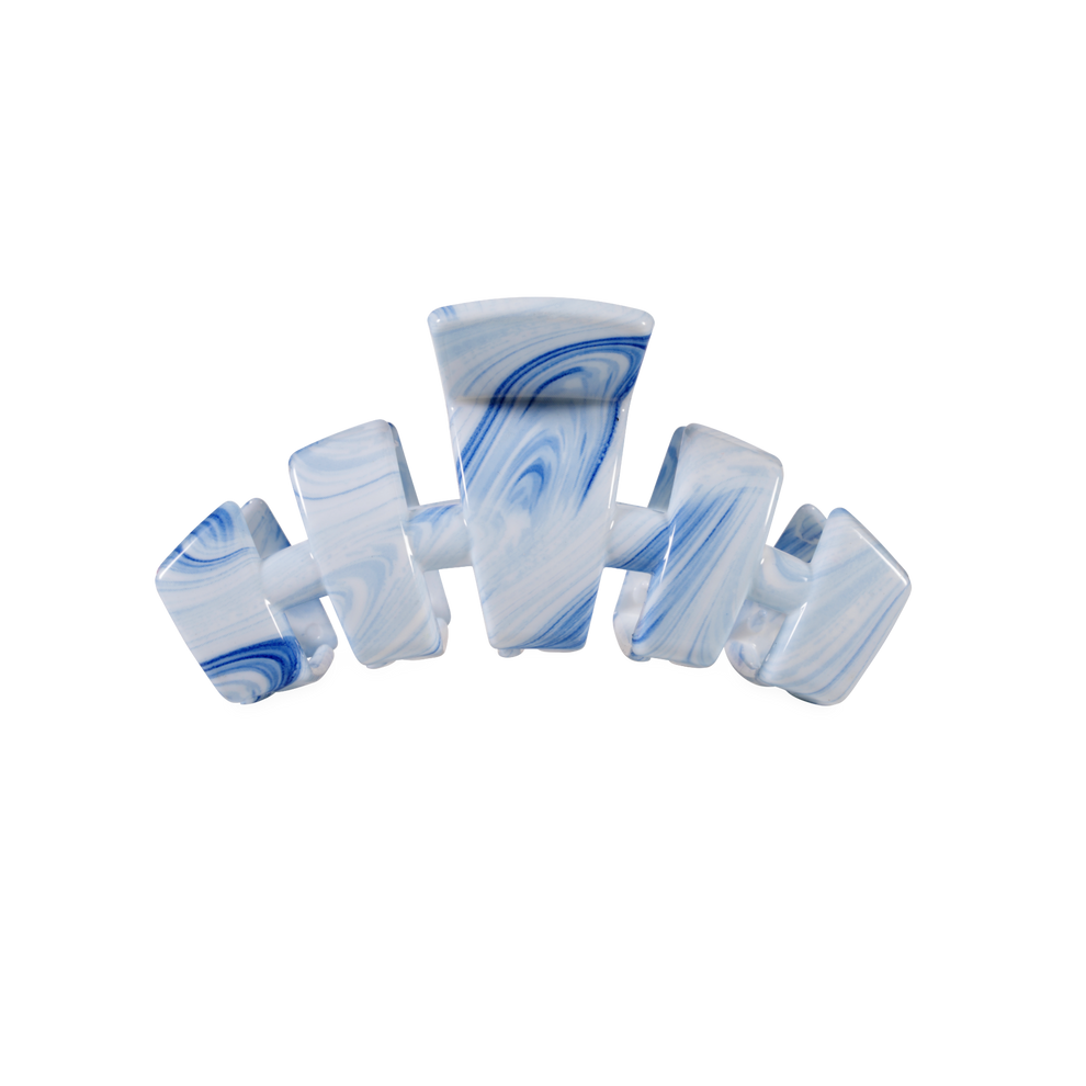 TELETIES blue and white swirled small claw clip with bendable teeth for a secure hold.
