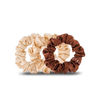 TELETIES small 100% silk scrunchies in neutral tones, sold in packs of three, featuring non-slip technology and gentle hair hold. Prevents breakage and creases with increased comfort.
