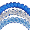 TELETIES On Call small spiral hair ties in blue, clear, and light blue shades for a secure, no-rip hold.
