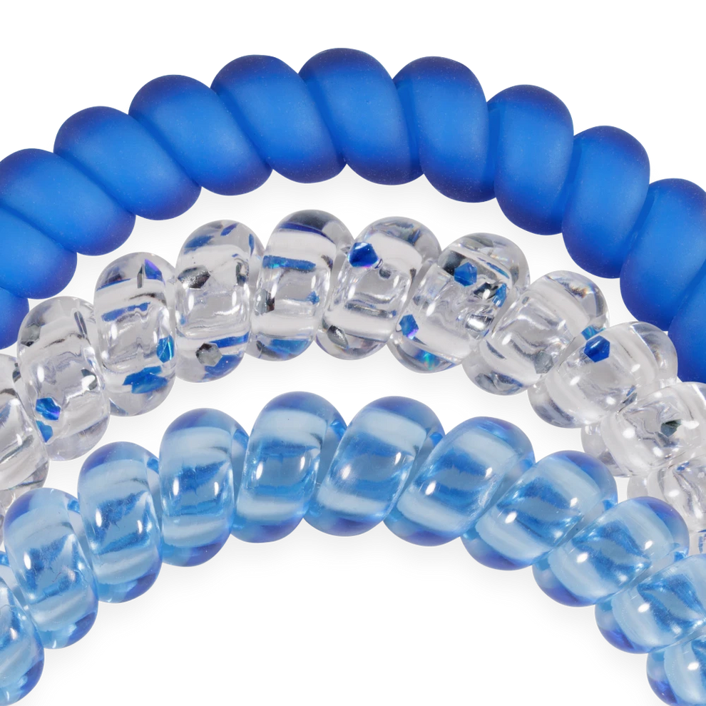 TELETIES On Call small spiral hair ties in blue, clear, and light blue shades for a secure, no-rip hold.
