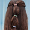 TELETIES Shades of Summer tiny hair ties in pink, green, and blue, perfect for braids or thin hair.
