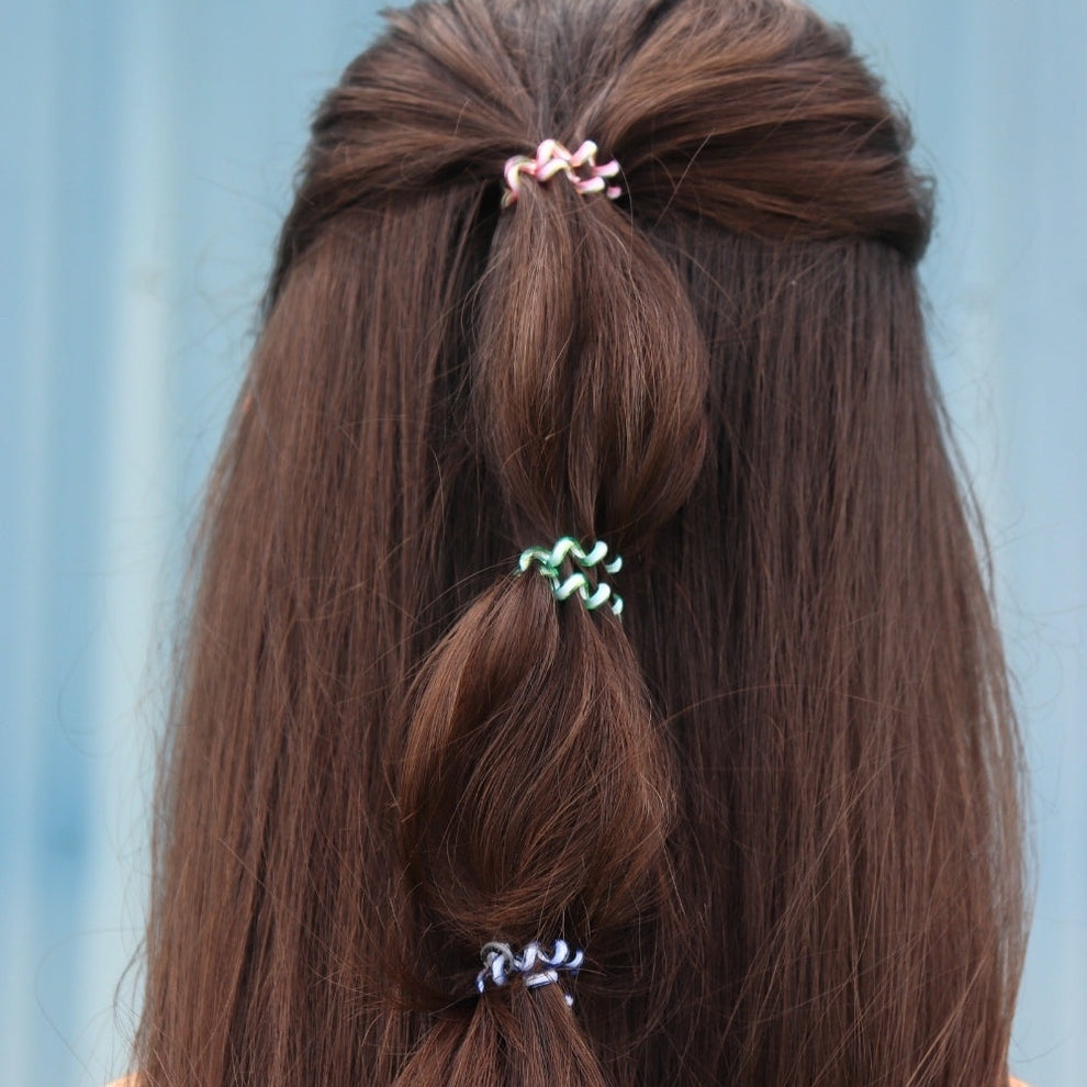 TELETIES Shades of Summer tiny hair ties in pink, green, and blue, perfect for braids or thin hair.
