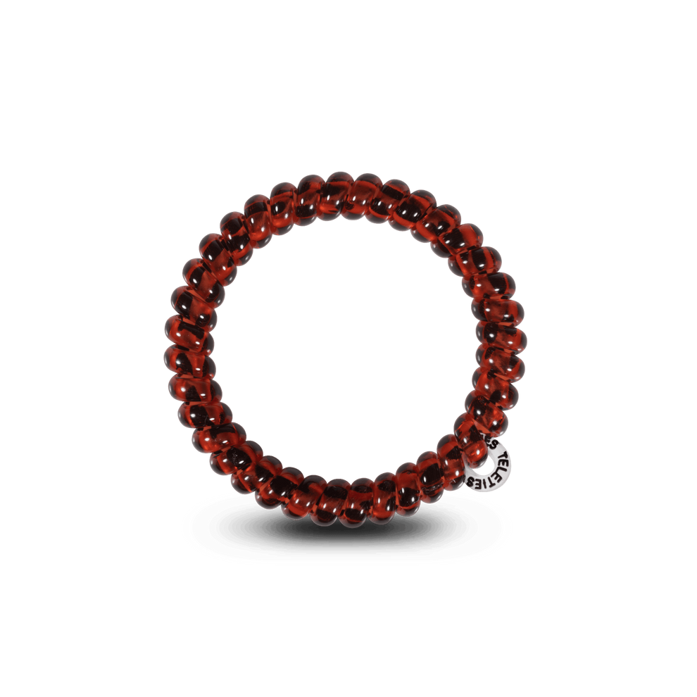 TELETIES Tortoise Small Hair Ties in a neutral, translucent deep brown color. Pack of 3 spiral hair ties with a strong grip with no breakage.
